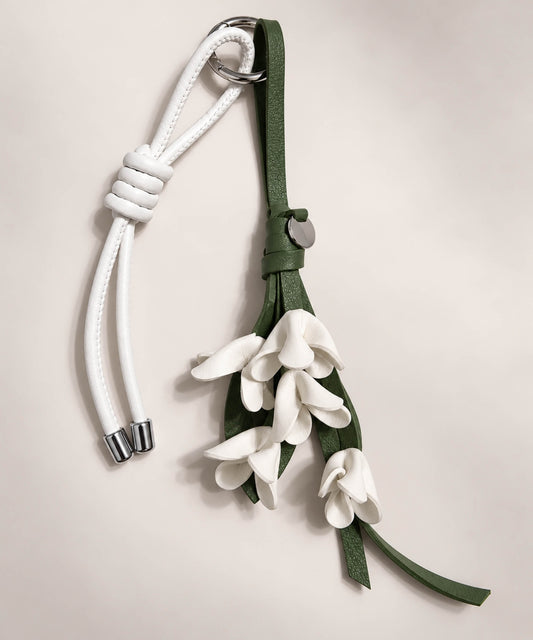 White floral PU leather bag charm keychain with cascading flower details