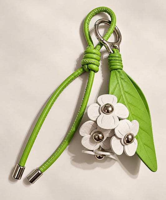 Jasmine PU leather-look bag charm keychain with green leaf and white flower details