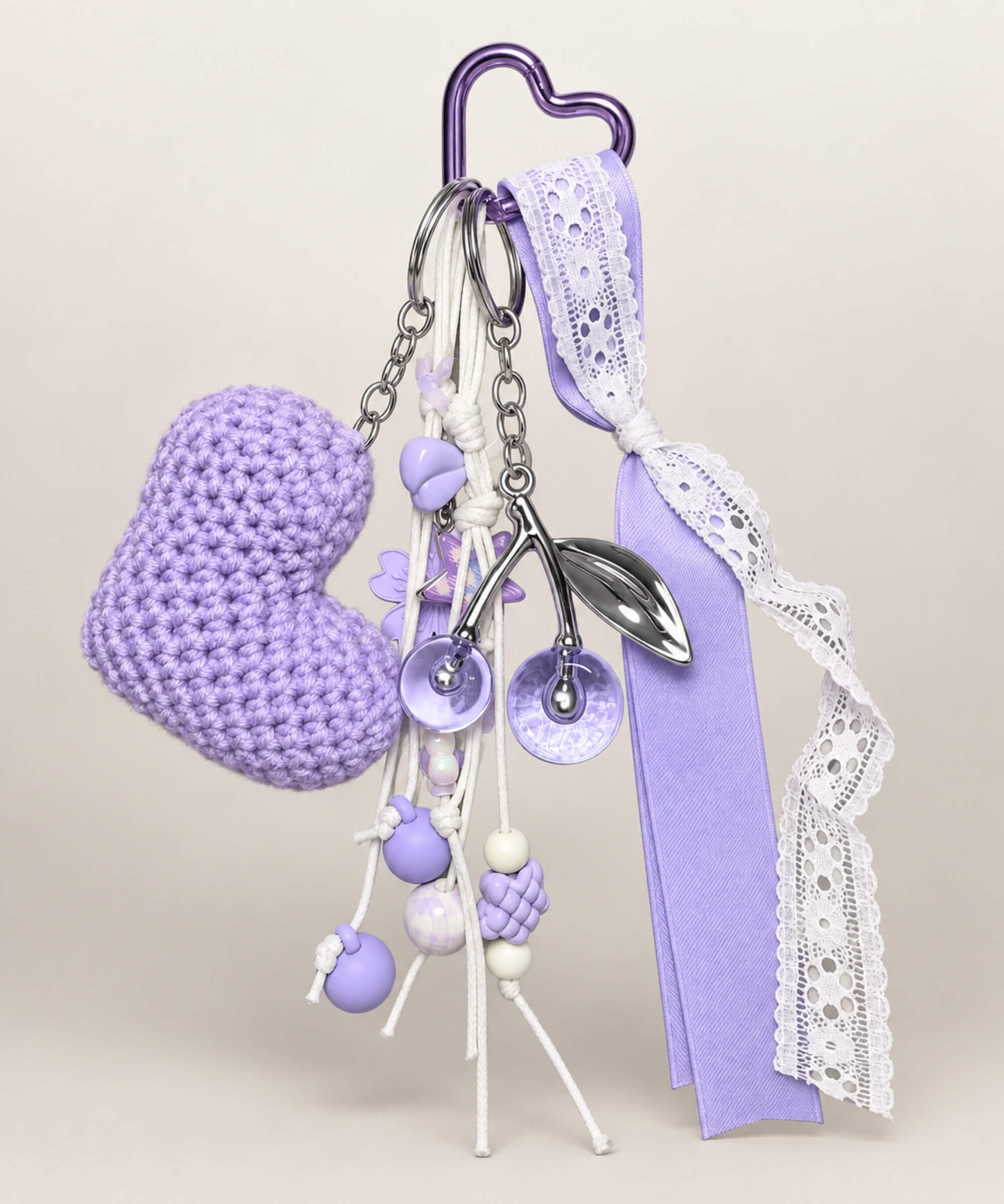 Purple heart crochet keychain with lace ribbon and decorative charms