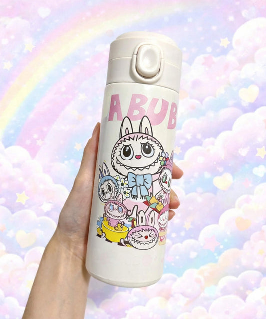Labubu style insulated water bottle with multiple cartoon characters design held in hand, 420ml stainless steel thermal bottle with pastel background