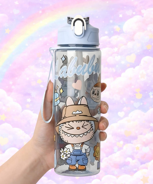 Labubu style straw water bottle with blue character design held in hand, 750ml flip top bottle with pastel background