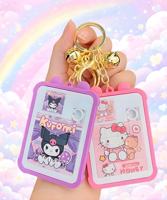 Sanrio Hello Kitty and Kuromi sliding puzzle keychain set held in hand with pastel rainbow cloud background, cute jigsaw bag charm design