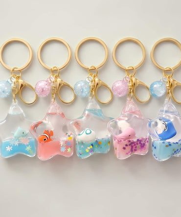 Star liquid glitter keychain floating animal charm bag accessory with dolphin octopus whale and clownfish