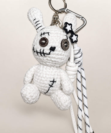 White voodoo bunny crochet keychain with button eyes and hanging cords
