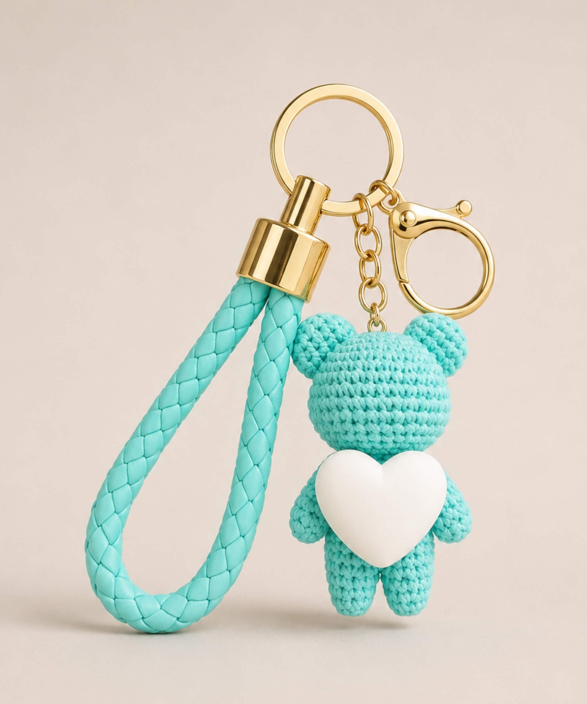 Aqua knitted-look heart bear resin keychain with white heart detail and matching braided wrist strap