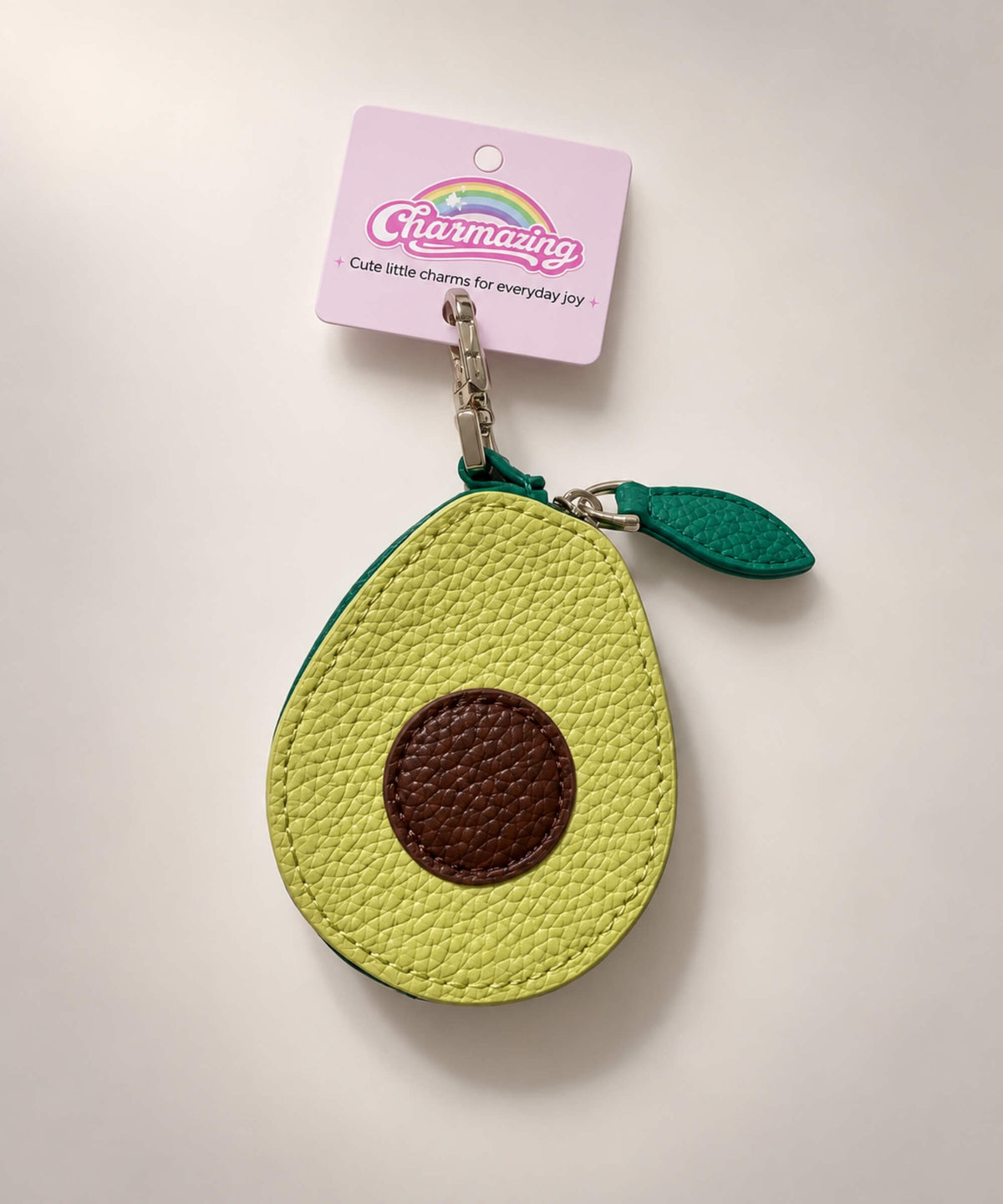 Avocado fruit coin purse keychain with green PU leather-style pouch, brown centre and leaf zipper pull
