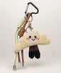 Cream croissant bakery crochet keychain with cute face and neutral brown straps