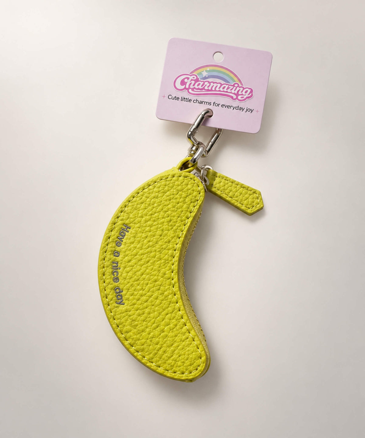 Banana fruit coin purse keychain with yellow PU leather-style pouch and Have a nice day detail