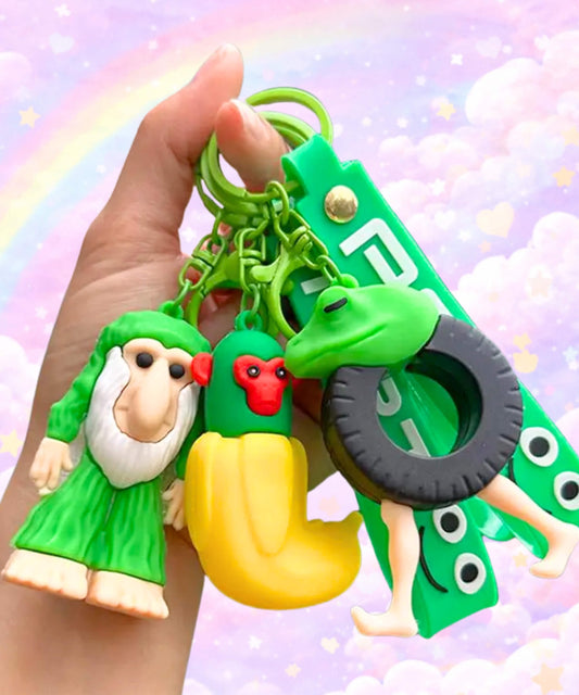Funny brainrot style character keychains held in hand, weird meme bag charms with random quirky designs and pastel background