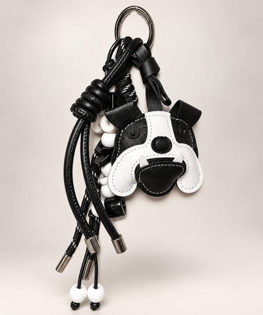 Black and white bulldog dog PU leather bag charm keychain with bead and cord details