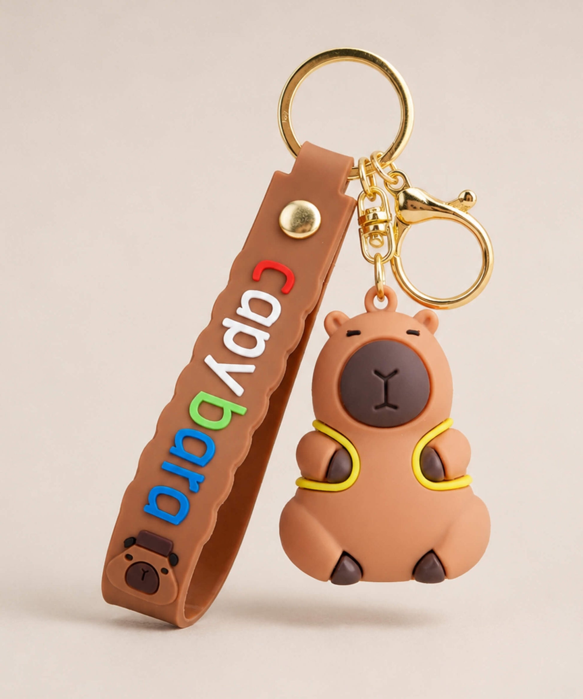 Capybara Backpack classic keychain with brown strap and gold hardware