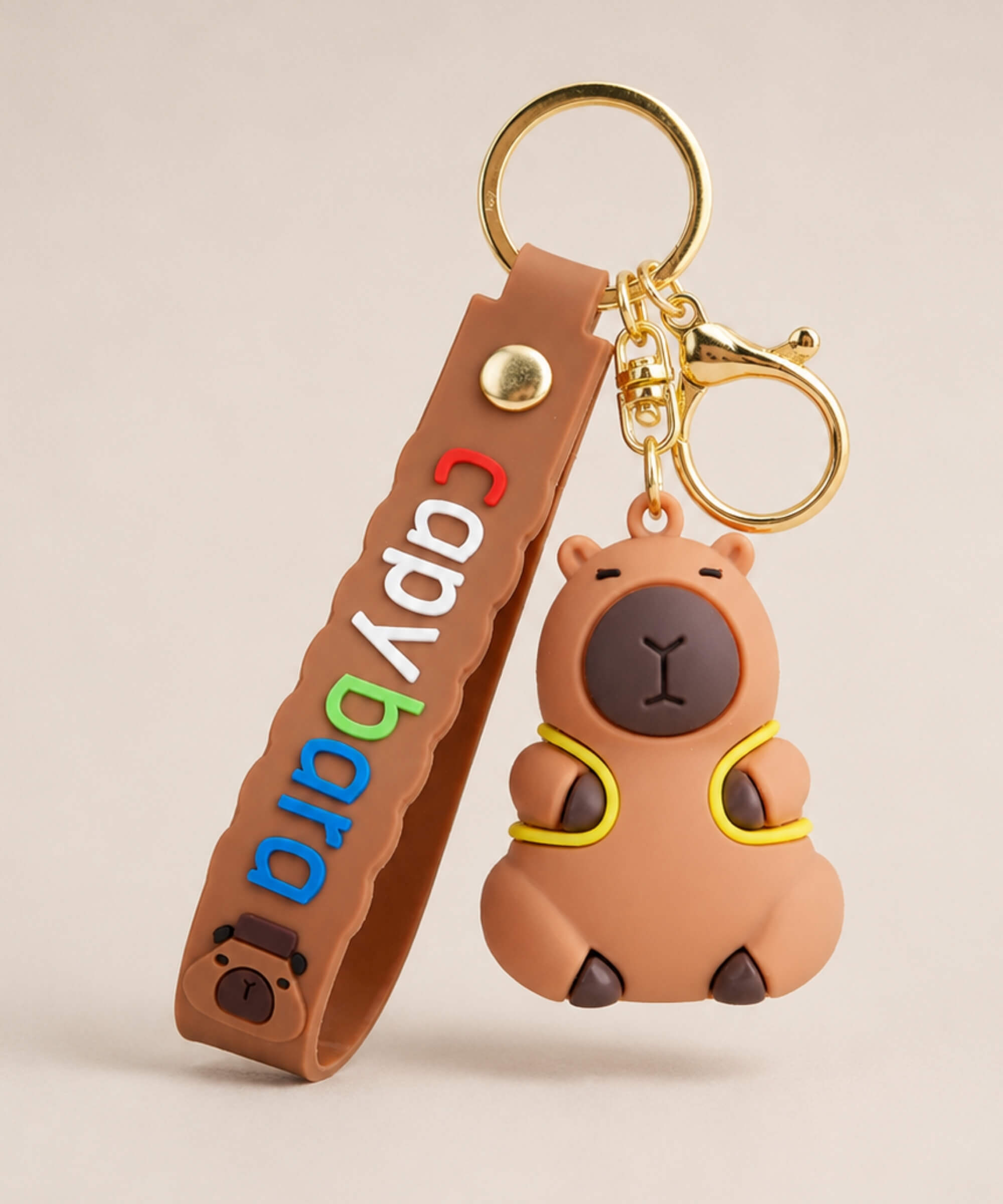Capybara Backpack classic keychain with brown strap and gold hardware