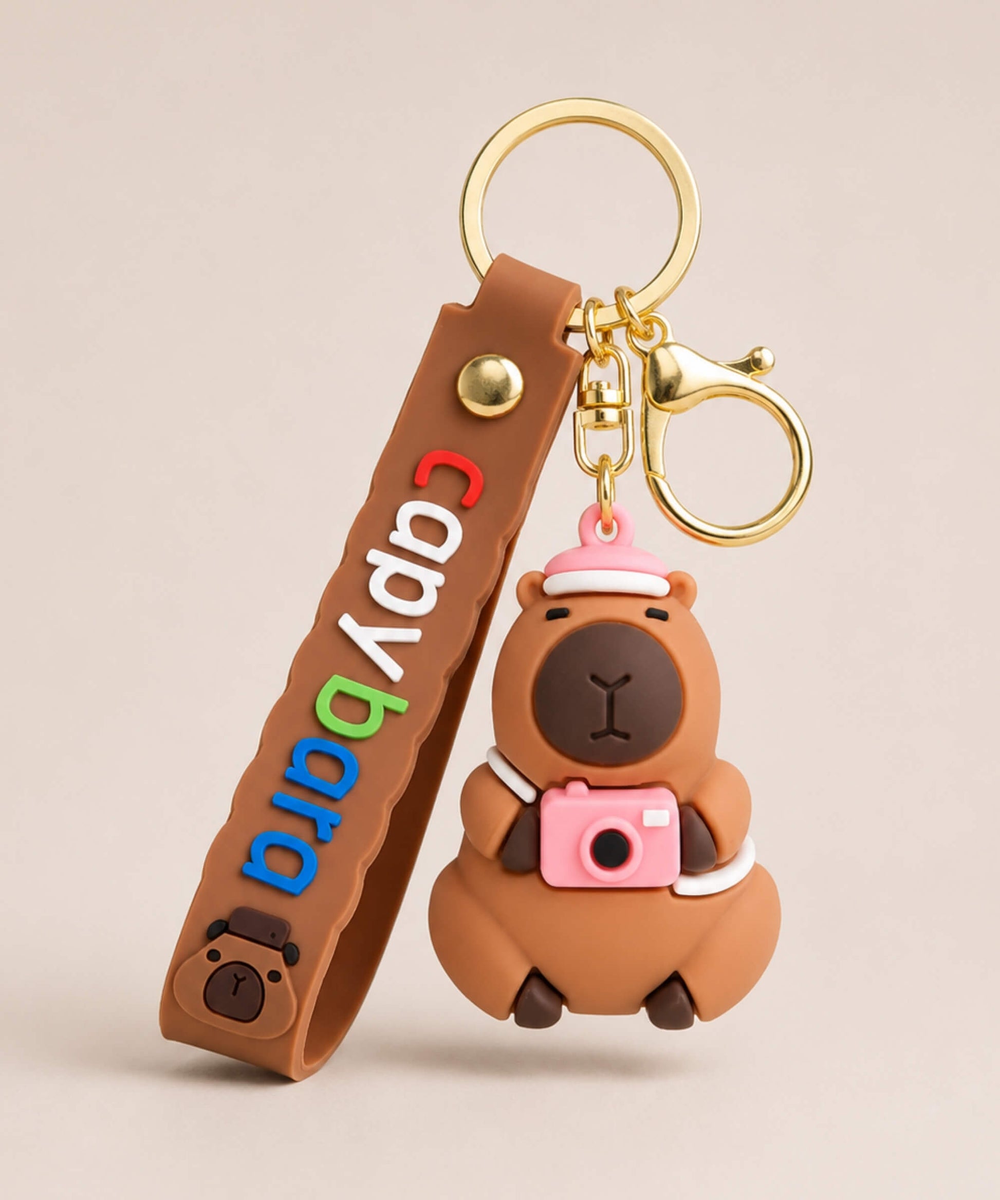 Capybara camera classic keychain with brown strap and gold hardware
