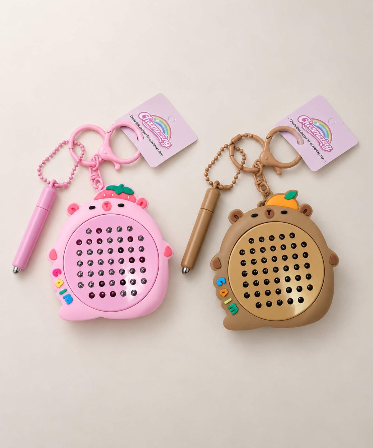 Pink and brown capybara magnetic bead drawing keychain variants with magnetic pens