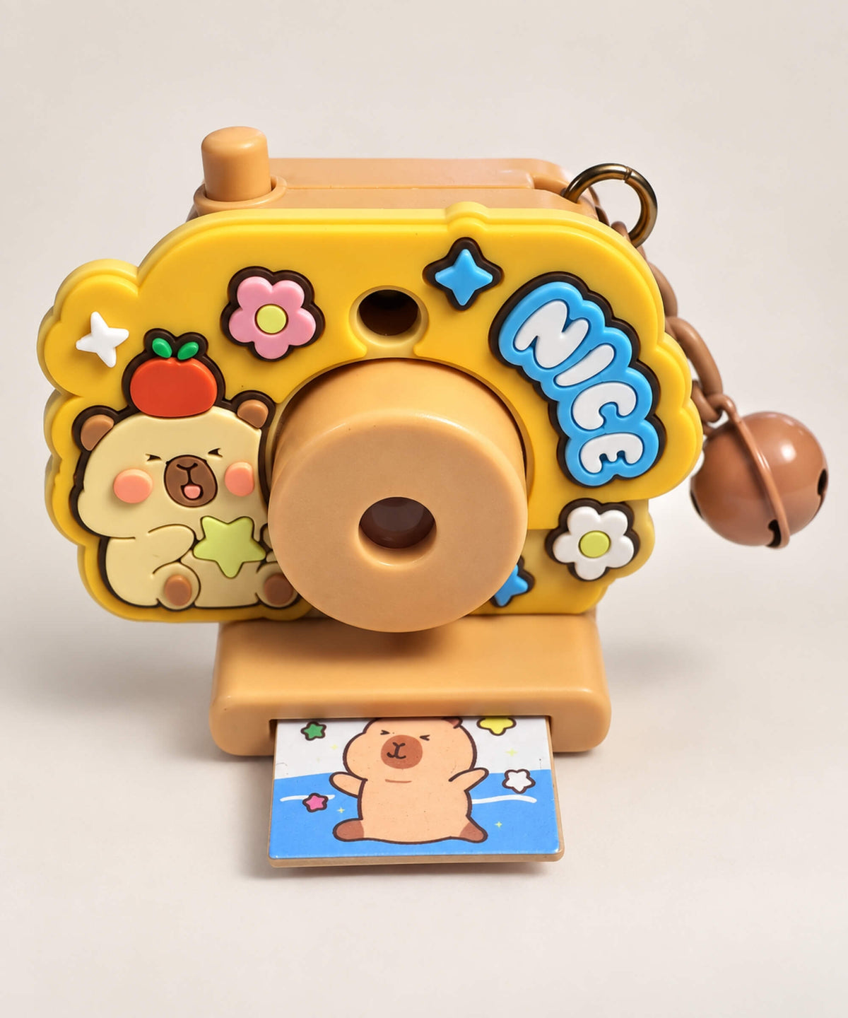 Close-up of Capybara Projection Camera Keychain with interactive projection feature