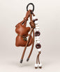 Brown cat PU leather bag charm keychain with decorative beads and long cord details