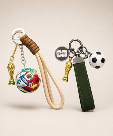 2026 World Cup inspired football keychains with trophy charms, football charms and green strap and rope strap designs