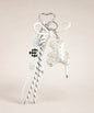 White bear PU leather bag charm keychain with a sparkle charm and decorative hanging charms on a neutral background.