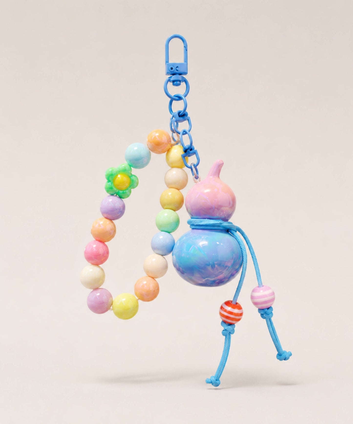Blue gourd beaded keychain with pastel beads, blue cord details and blue clasp
