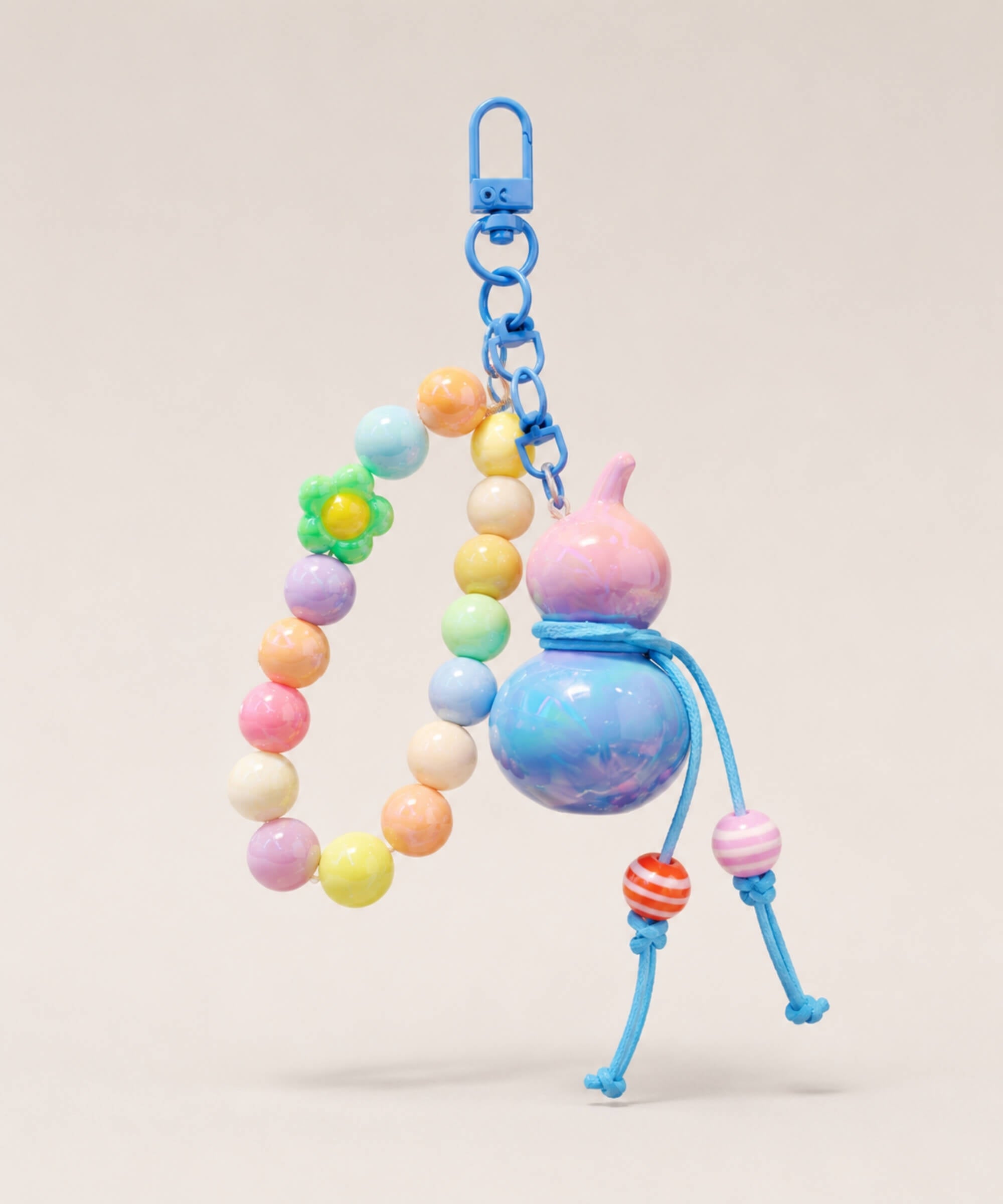 Blue gourd beaded keychain with pastel beads, blue cord details and blue clasp