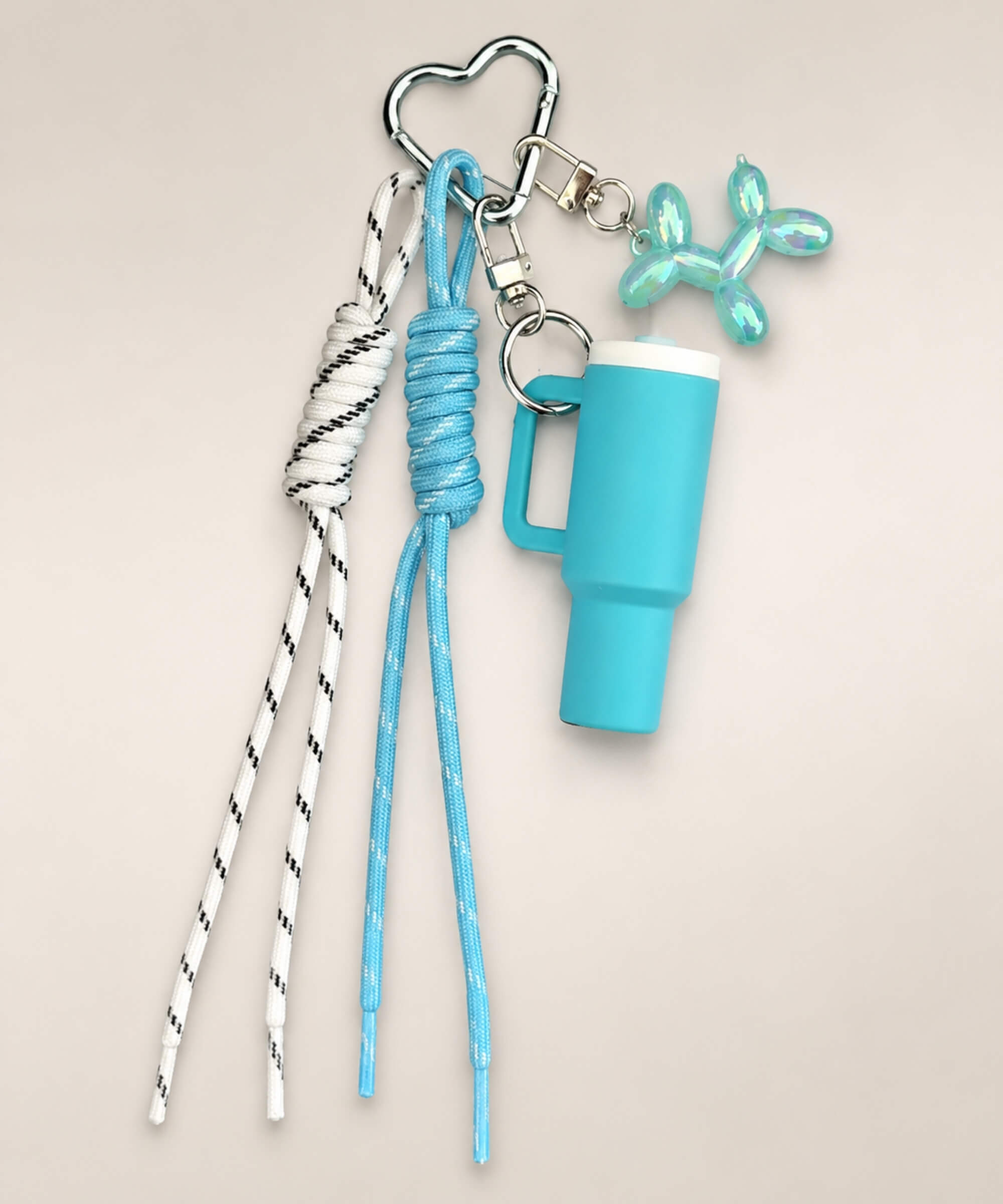 Blue tumbler cup rope keychain with heart carabiner, rope straps and balloon dog charm