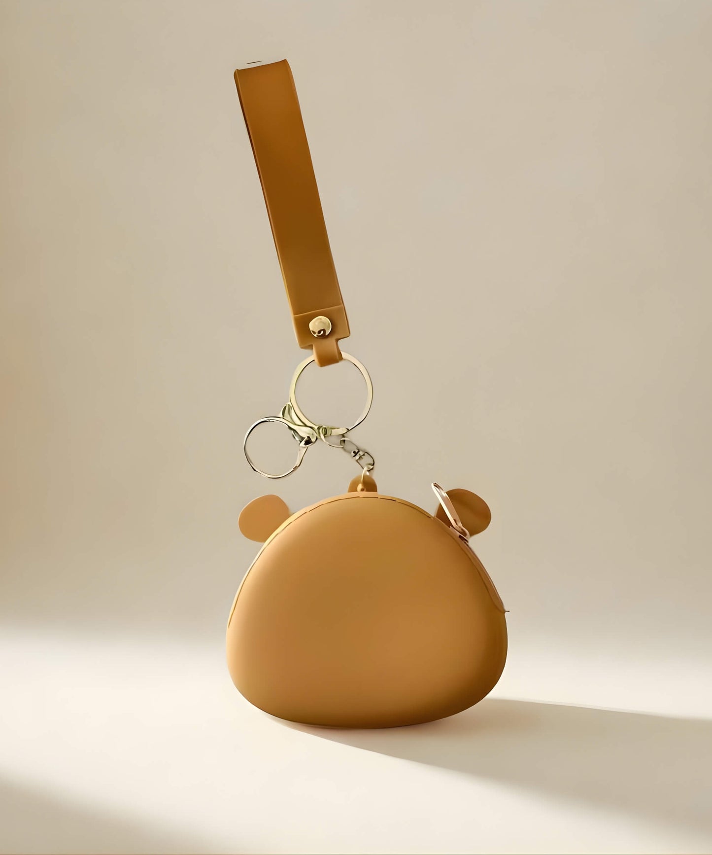 Capybara silicone coin purse keychain back view showing smooth design and strap