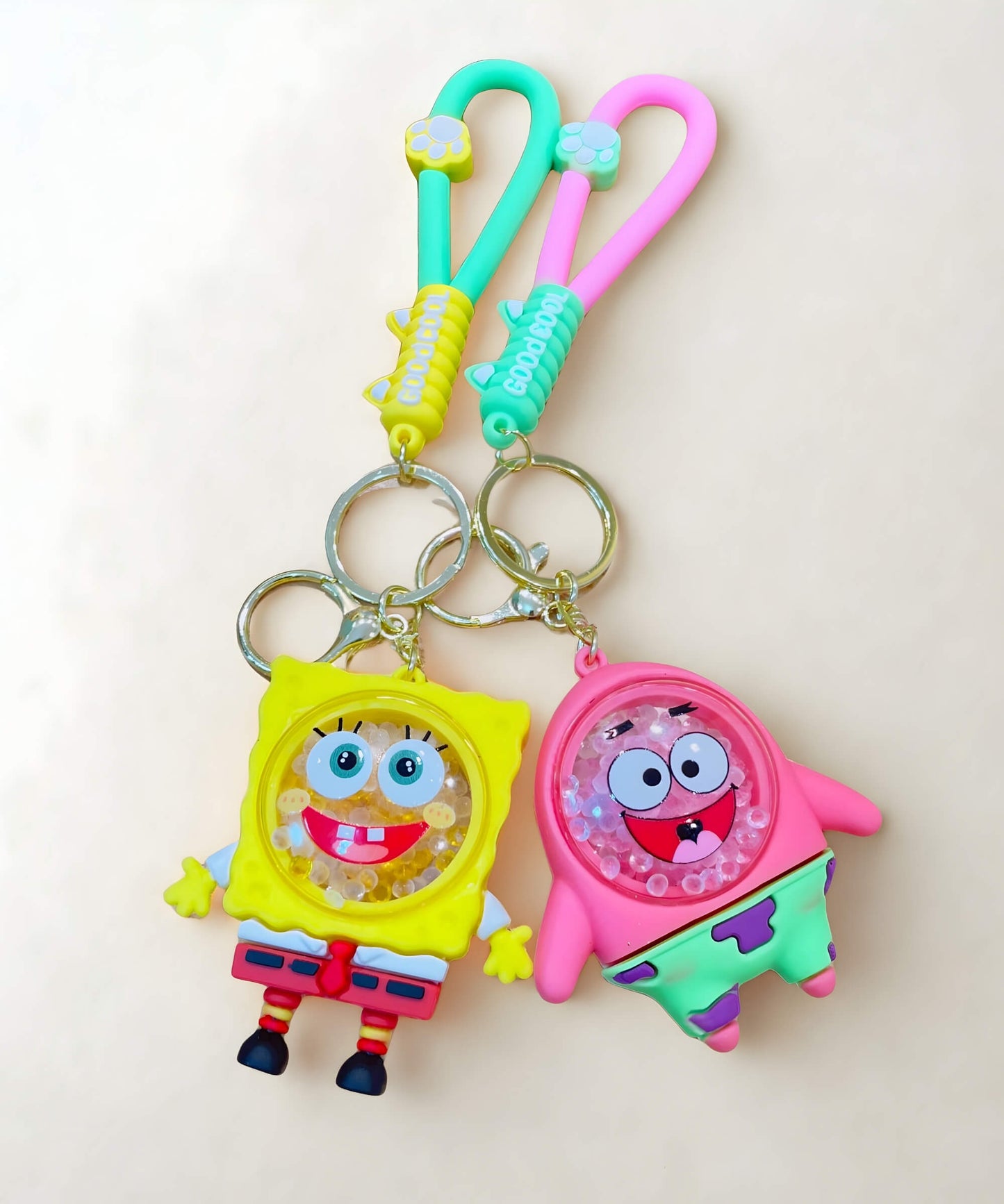Cute cartoon bubble bead keychain set in pink and yellow