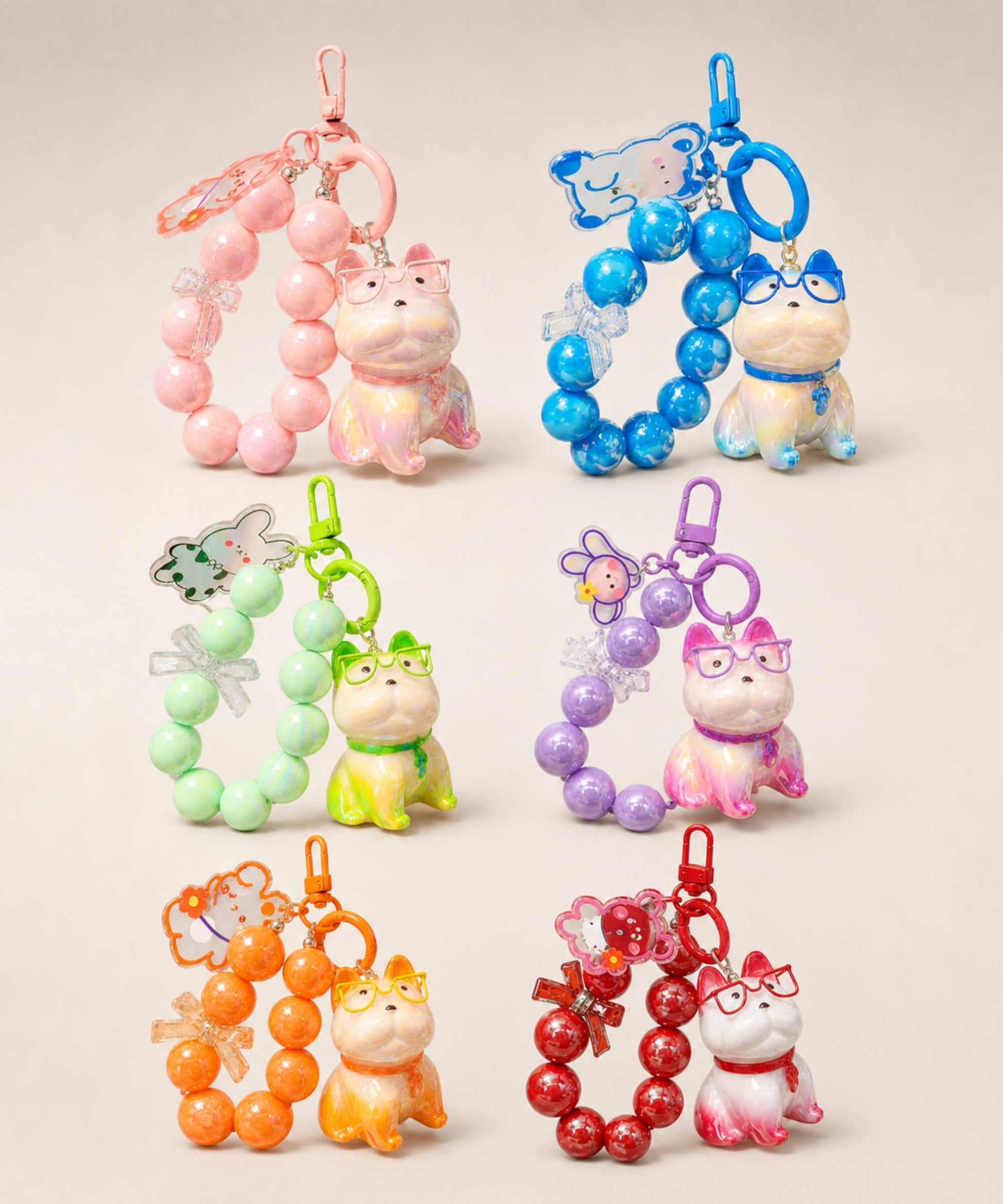 French Bulldog beaded keychains in assorted colour options displayed together on a neutral background