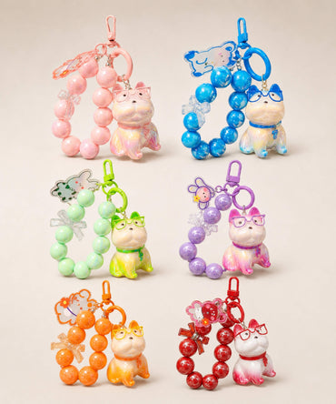 French Bulldog beaded keychains in assorted colour options displayed together on a neutral background