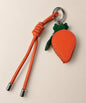 Carrot fruit coin purse keychain with orange PU leather-style pouch, green leaf detail and matching strap