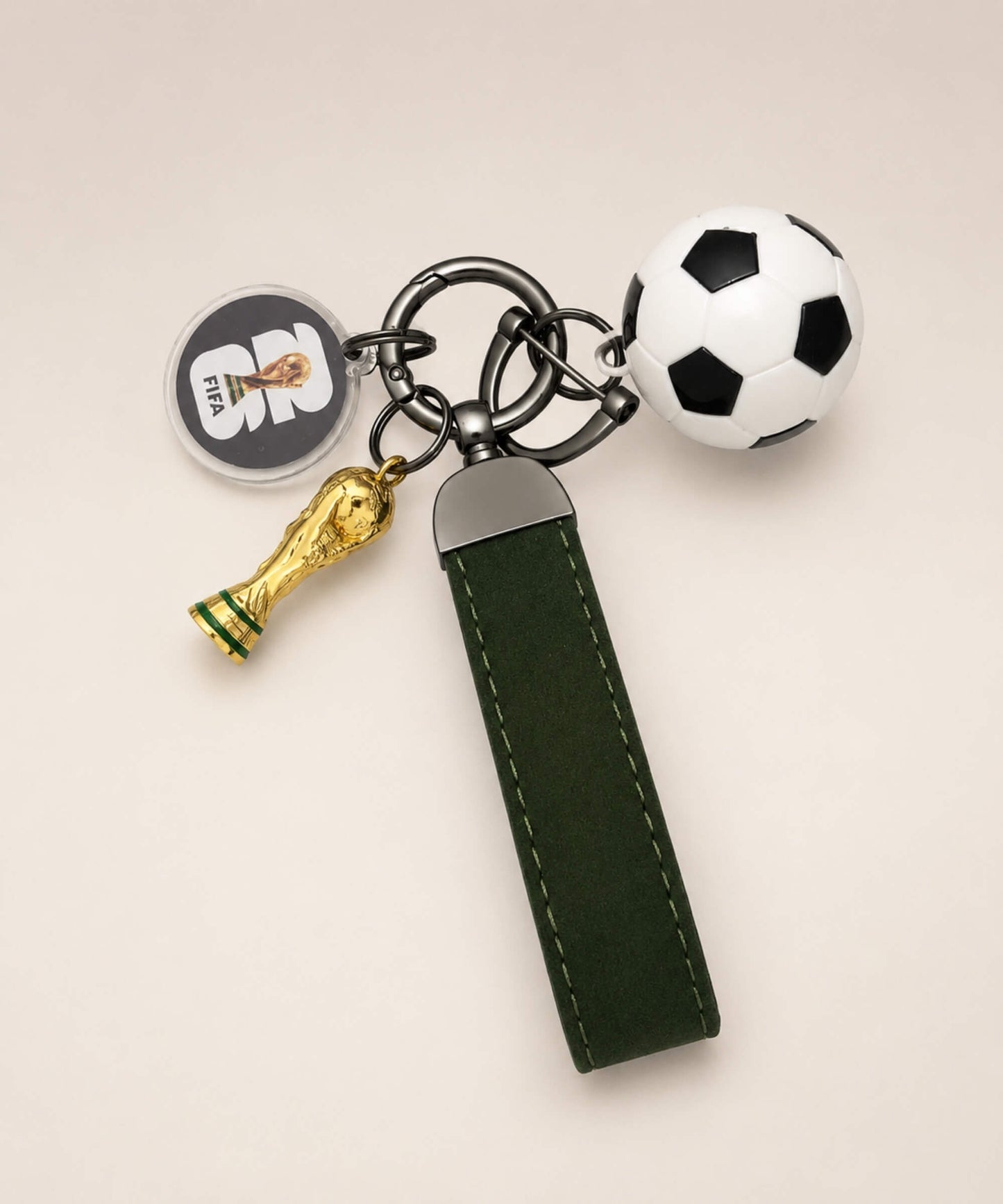 2026 World Cup inspired football keychain with soccer ball charm, trophy charm and green wrist strap