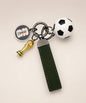2026 World Cup inspired football keychain with soccer ball charm, trophy charm and green wrist strap