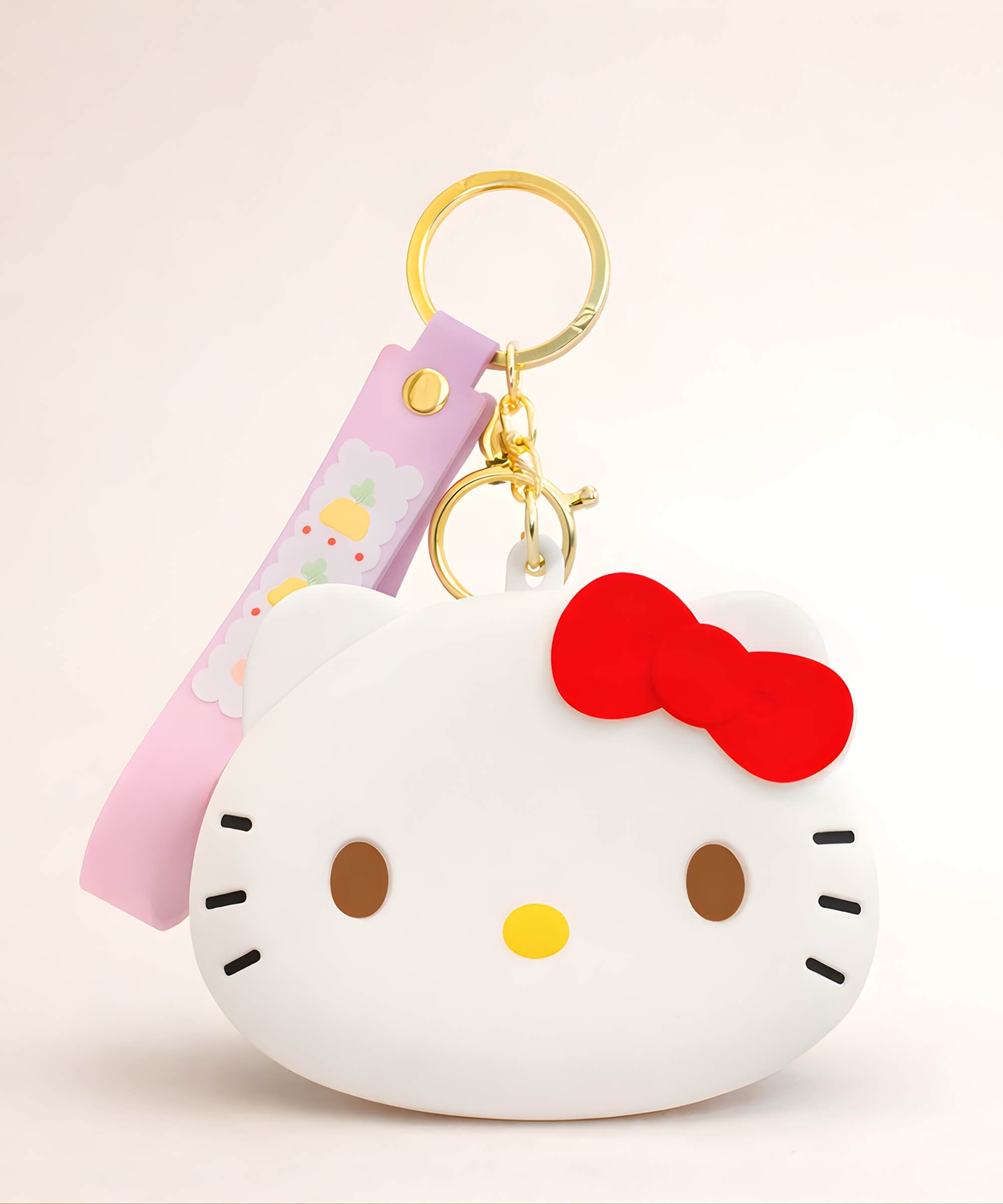 Hello Kitty silicone coin purse keychain in white, cute Sanrio character mini pouch bag charm