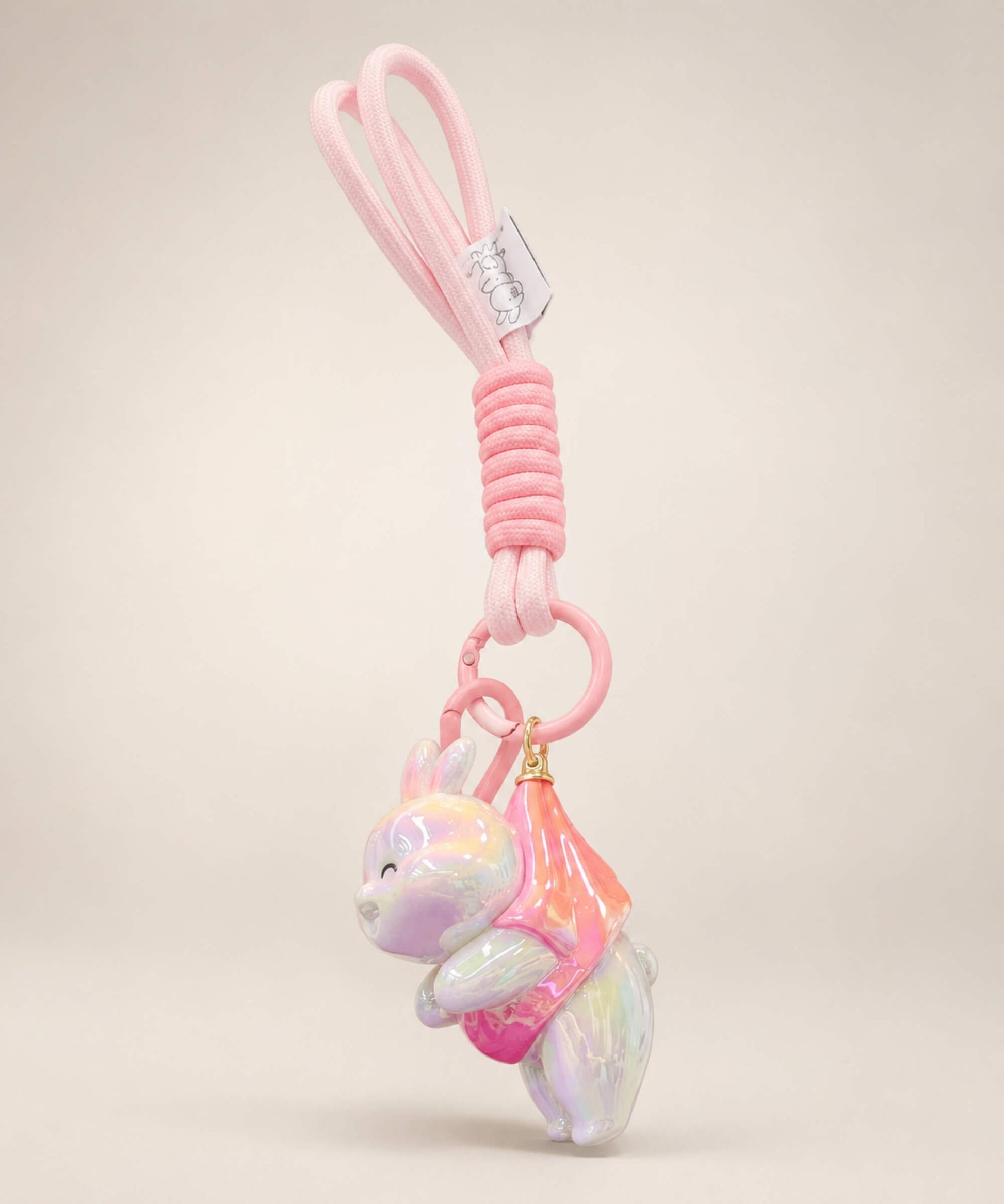 Iridescent bunny resin keychain in pink