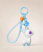 Blue iridescent deer resin keychain with matching blue strap, purple eye detail and pastel pearlescent finish
