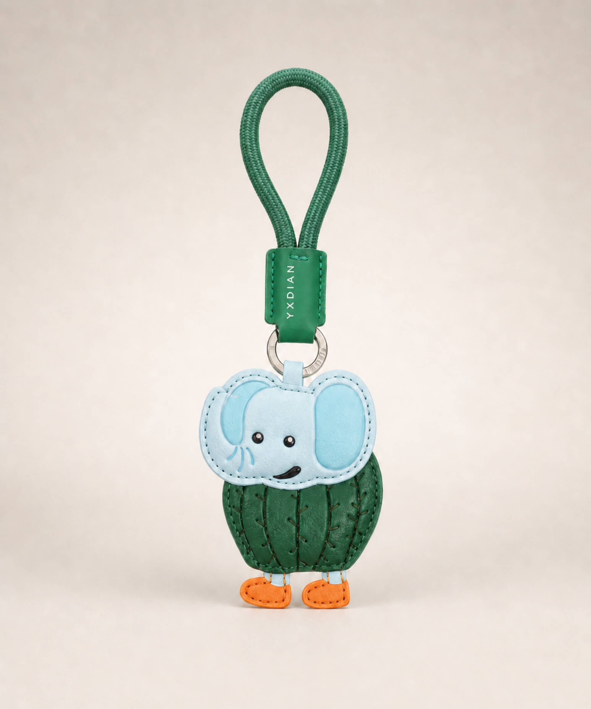 Lirily Larila Italian Brainrot style PU leather keychain with green wrist strap on a clean studio background.