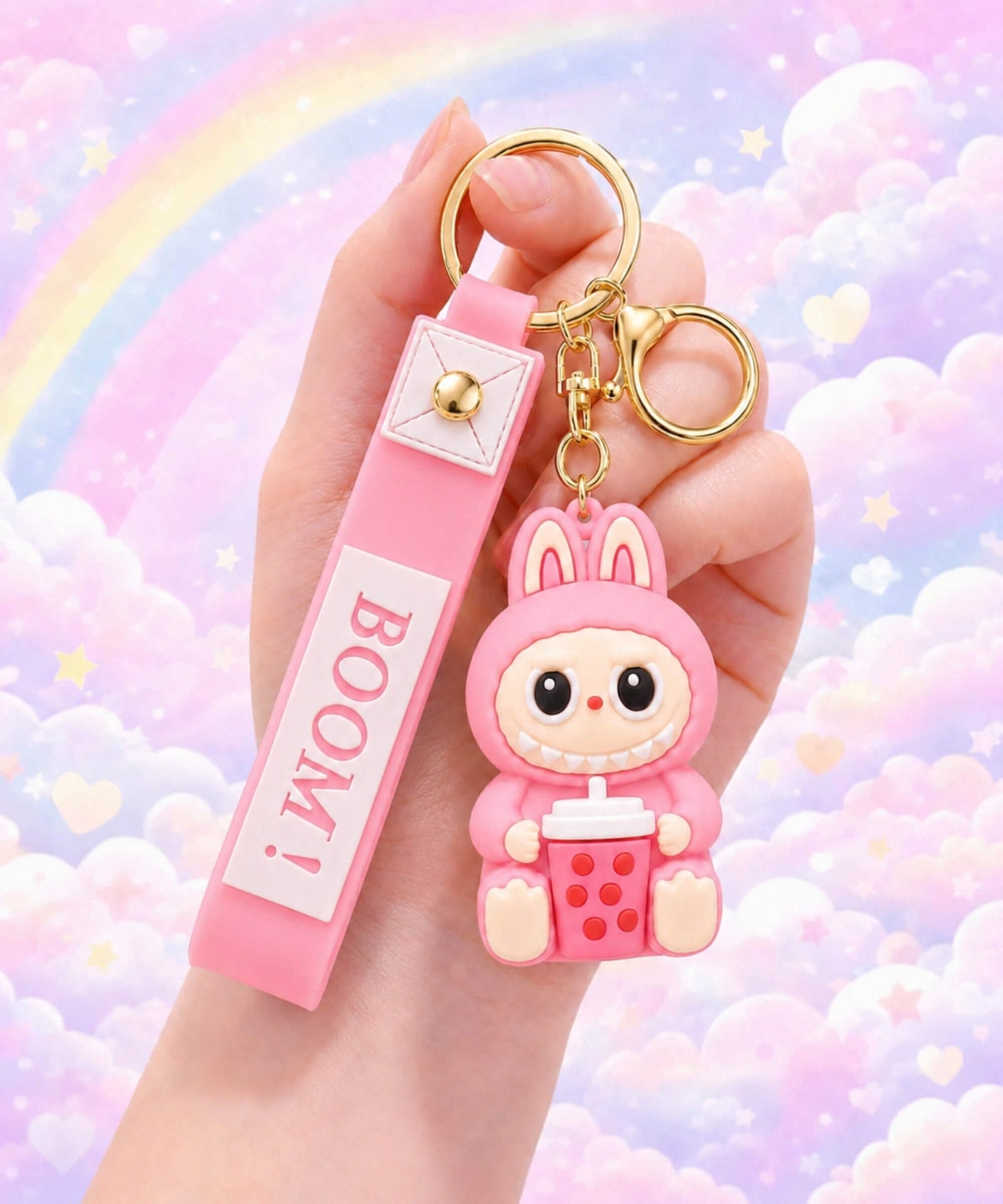 Pink Labubu style bubble tea keychain held in hand