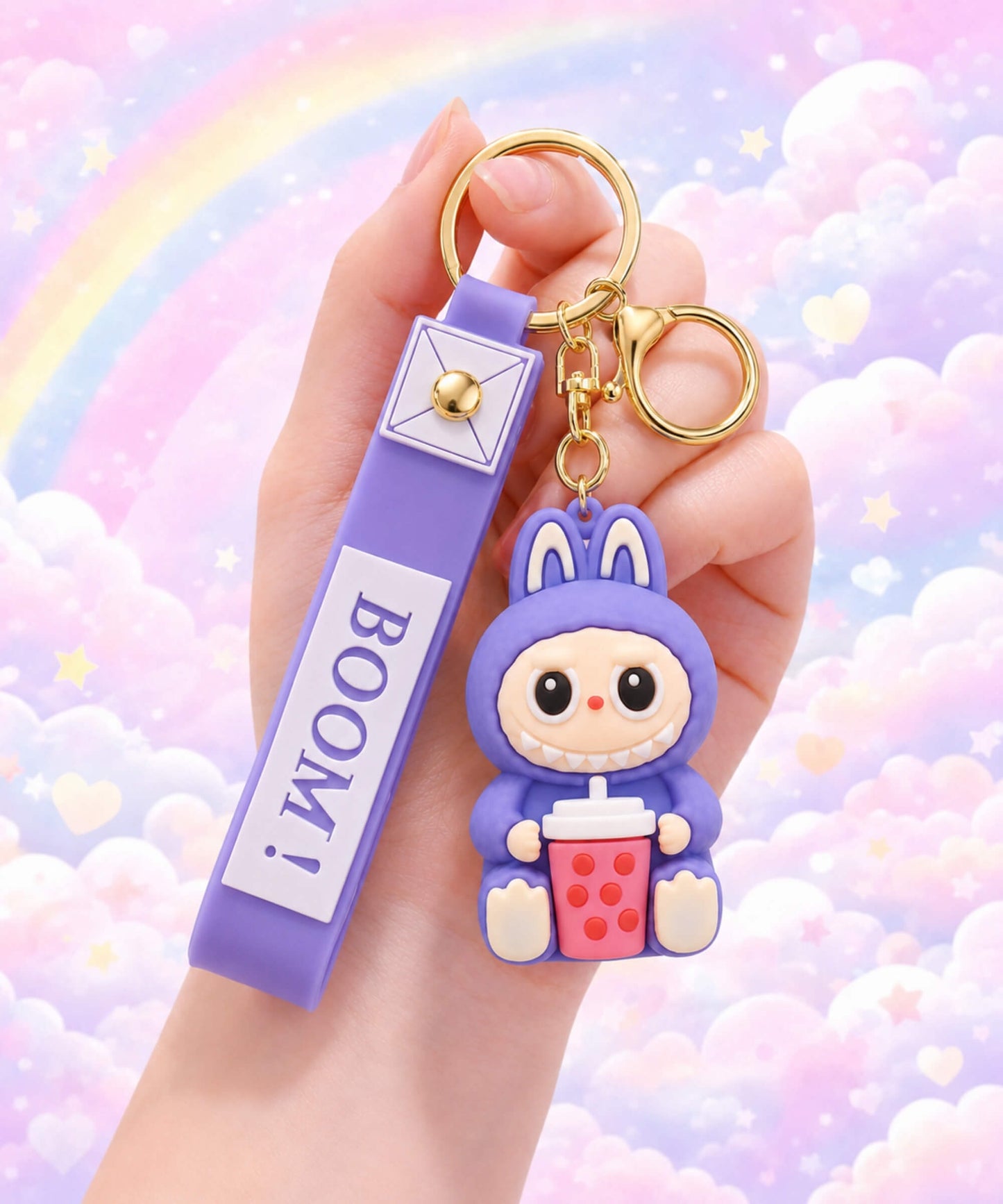 Purple Labubu style bubble tea keychain held in hand