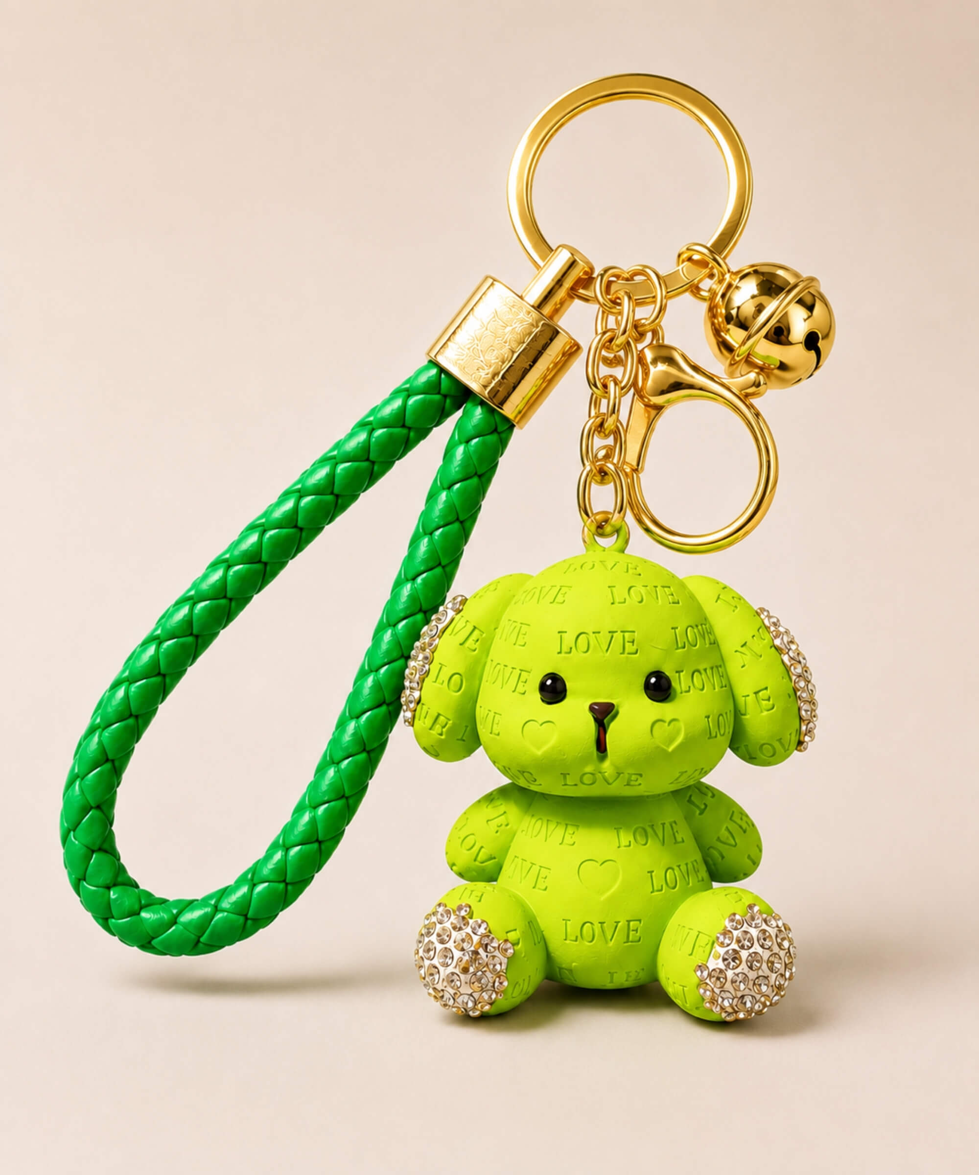 Green love puppy resin keychain on a neutral background.