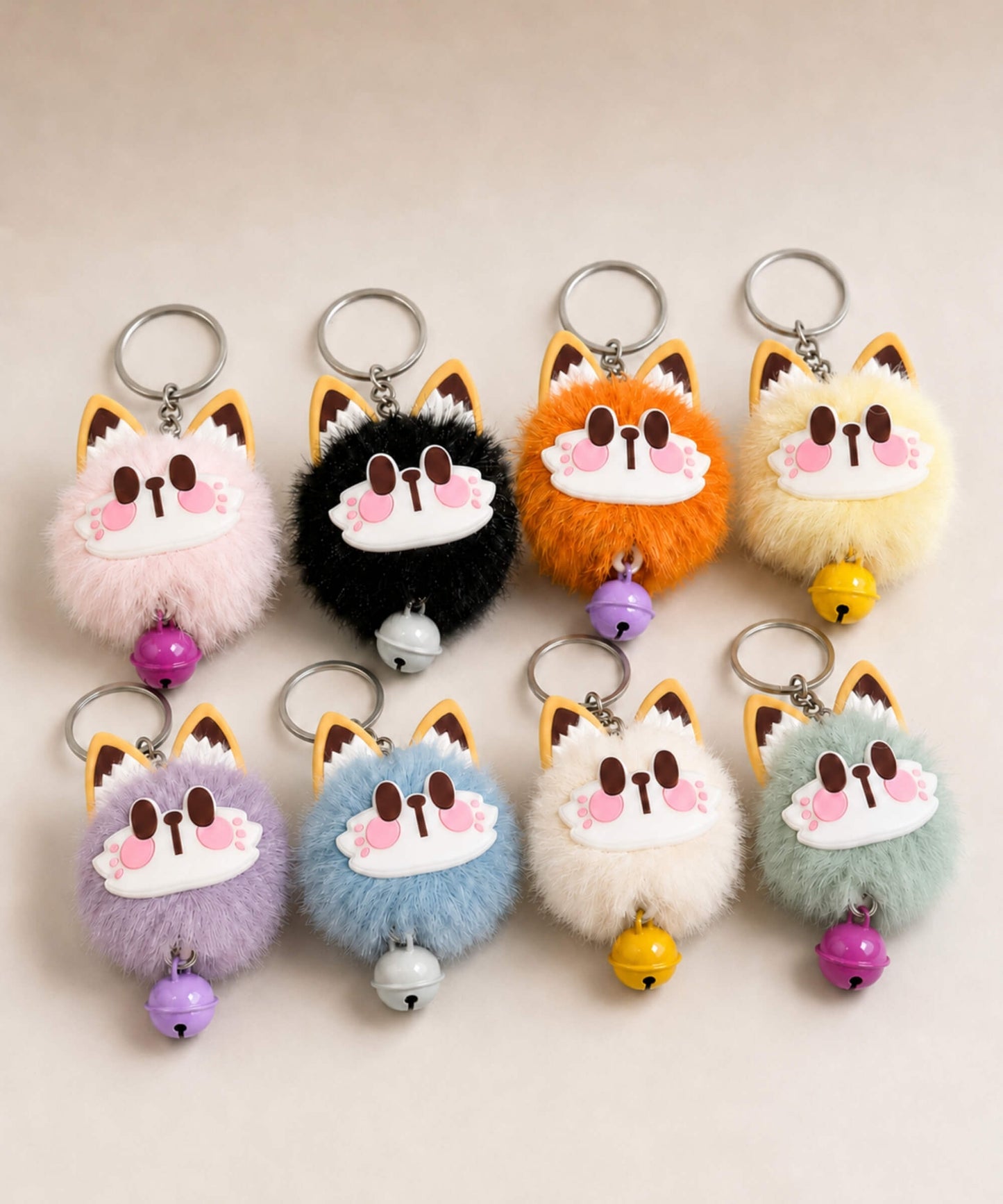 Lucky cat bell plush keychains in pink, black, orange, yellow, purple, blue, cream and mint colour options