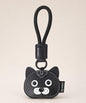 Black cat pet face PU leather bag charm keychain on a neutral background.