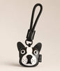 Bulldog pet face PU leather bag charm keychain on a neutral background.