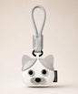 Grey cat pet face PU leather bag charm keychain on a neutral background.