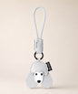 Poodle pet face PU leather bag charm keychain on a neutral background.