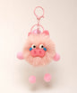 Pig plush keychain with soft pink fluffy body, pig face detail, bell charm and pink clip