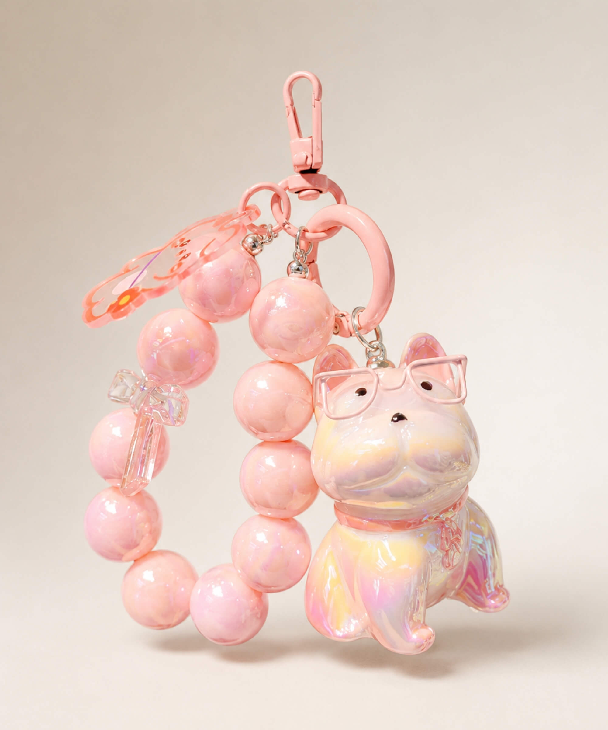 Pink French Bulldog beaded keychain with glasses, bead loop and charm details on a neutral background