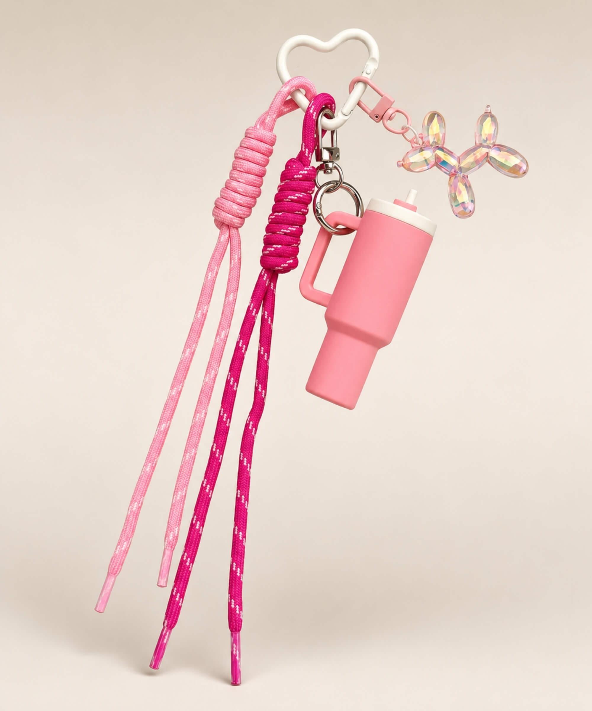Pink tumbler cup rope keychain with heart carabiner, rope straps and balloon dog charm
