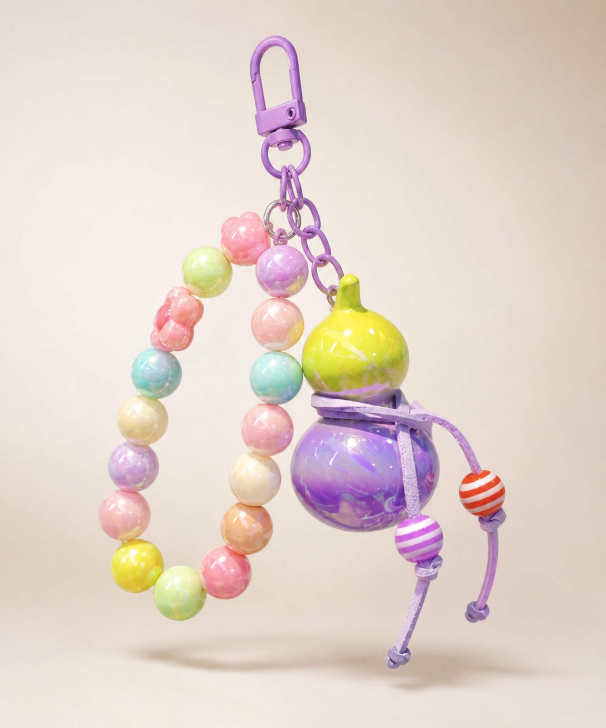 Purple whale beaded keychain with glossy purple beads, bow charm and heart detail