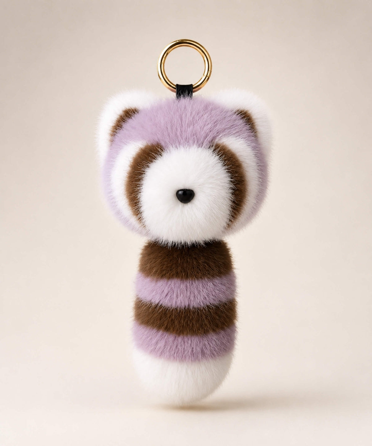 Purple raccoon plush keychain with brown and white details and gold key ring