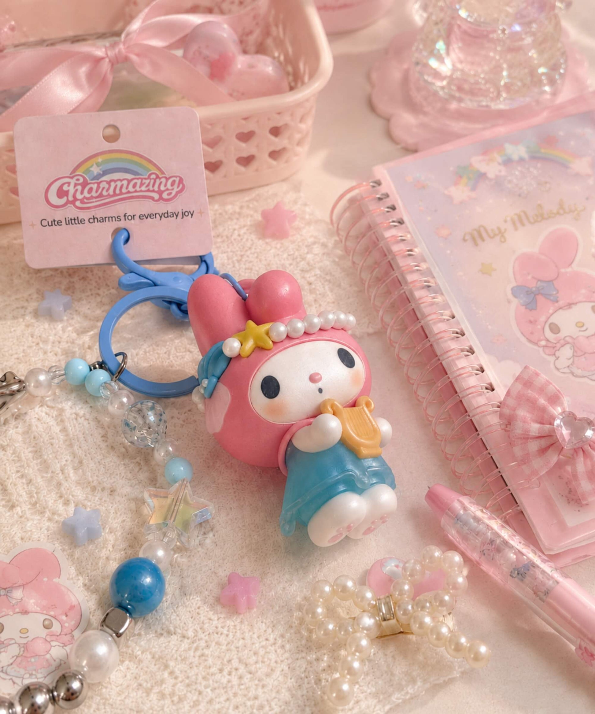 Pink My Melody princess Sanrio beaded keychain styled with pastel stationery, pearl-look beads and CHARMAZING packaging